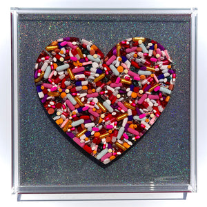 Pill Heart on Holographic Silver Ribbon Base, 12x12” frame